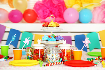 Wall Mural - Prepared birthday table with sweets for children party