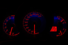 Red Speedometer In Car