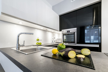 Modern design kitchen in black and white style