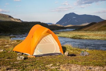 Wall Mural - tent in the evening sun in sweden