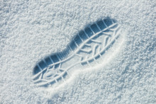 Single Man’s Footprint On The Fresh Fluffy Snow