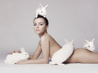 Beautiful woman with rabbit