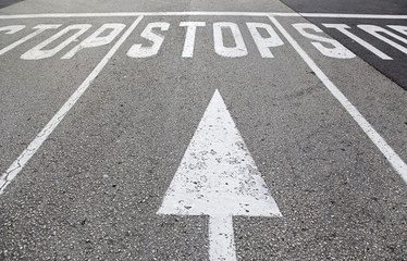 Wall Mural - Stop sign on asphalt