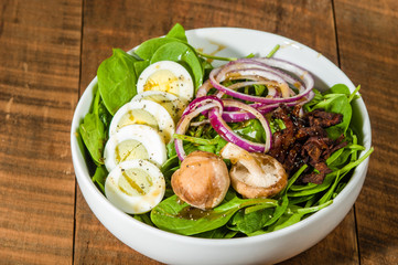 Wall Mural - Egg and spinach salad close up