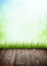 Summer Background With Wooden Floor, Green Grass And Bokeh