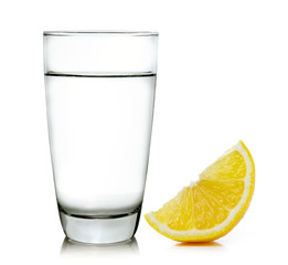 water with lemon on white background