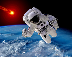 Wall Mural - astronaut spaceman asteroid meteorite