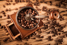 Vintage Manual Coffee Grinder With Coffee Beans