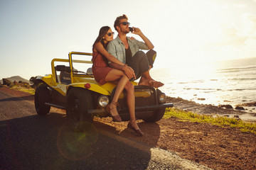 Wall Mural - Couple on holiday on a sunny summer's day