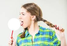 Teen Girl Licking Empty Circle On A Red Stick