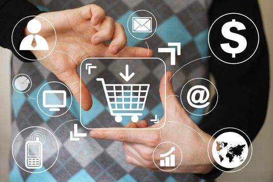 Hand press on shopping cart icon virtual.