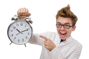 Wall Mural - Funny doctor with alarm clock isolated on white