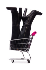 Woman shoes in shopping cart on white