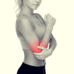 Poster - sporty woman with pain in elbow