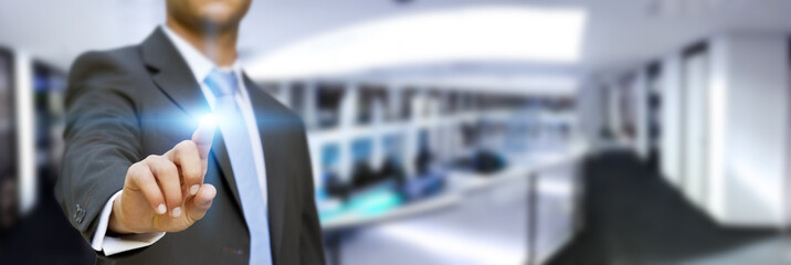 Poster - Businessman in his office using tactile interface
