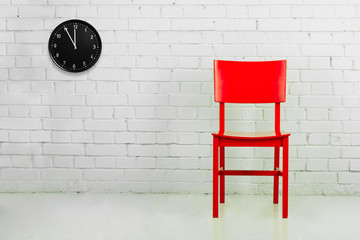 Red chair with clock