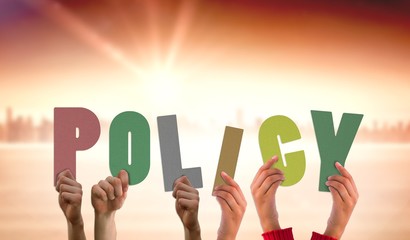 Poster - Composite image of hands holding up policy