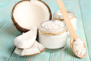 Sticker - Fresh coconut oil in glassware and wooden spoon
