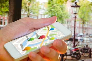 Aufkleber - Composite image of man using map app on phone