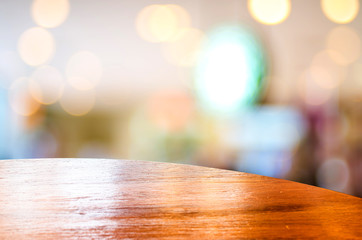 Poster - Empty round table top at coffee shop blurred background with bok