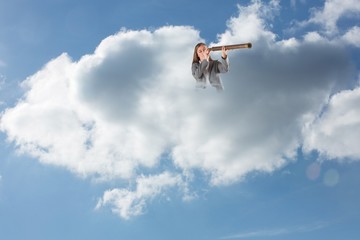 Poster - Composite image of businesswoman looking through a telescope