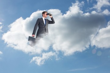 Poster - Composite image of businessman looking through binoculars