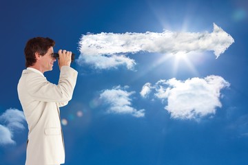 Poster - Composite image of businessman using binoculars