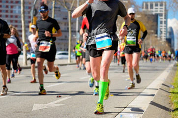 Wall Mural - Marathon running race, runners feet on road, sport concept