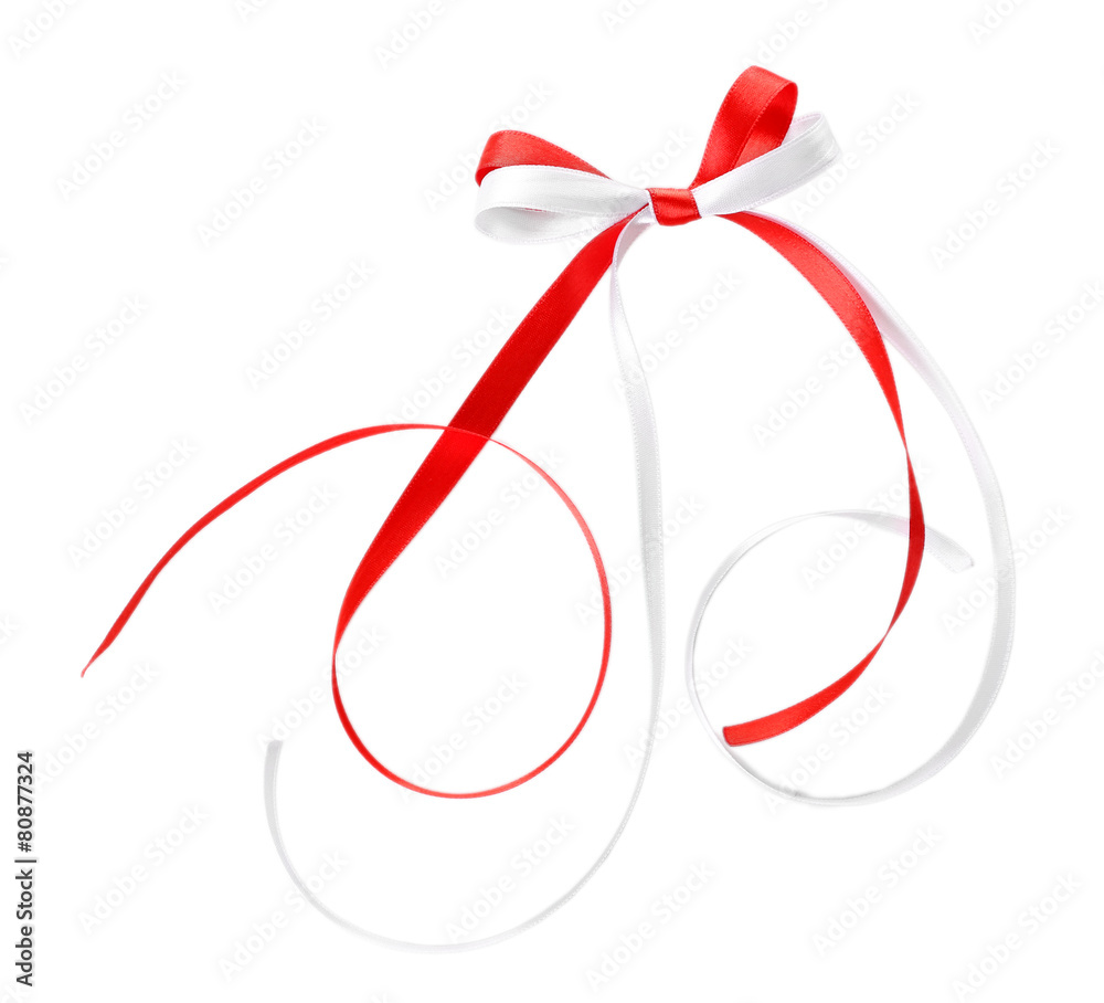 Colorful red and white ribbons with bow isolated on white