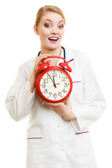 Poster - Woman doctor with clock isolated on white