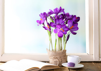 Poster - Purple crocus on windowsill background