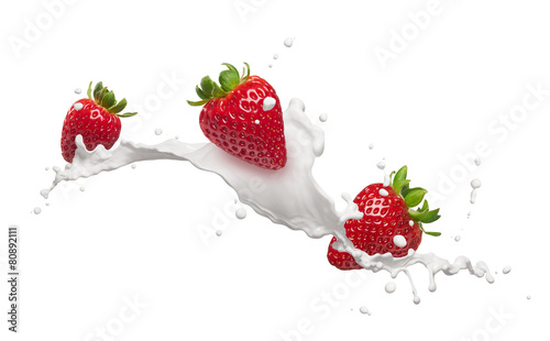 Fototapeta na wymiar strawberries with milk splash