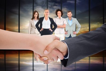 Poster - Composite image of close up of a handshake