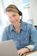 © goodluz - Active woman teleworking from home