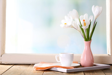 Poster - White crocus in vase on windowsill background