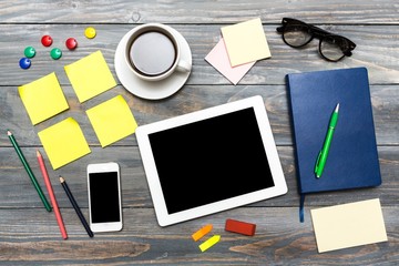 Poster - Desk. Overhead of essential office objects in order on wooden