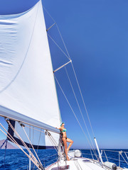 Wall Mural - Happy woman on sailboat