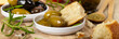 Bread with olive oil. Panoramic image. Selective focus.