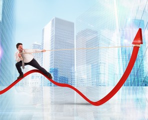 Wall Mural - Businessman lifts statistics