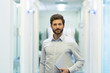 © ldprod - Portrait of handsome bearded business man in corridor office