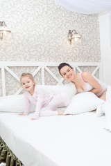 Wall Mural - Mother and daughter in bed