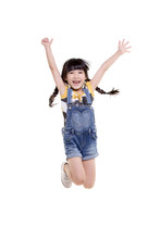 Portrait Of Happy Little Asian Child Jumping Isolated On White