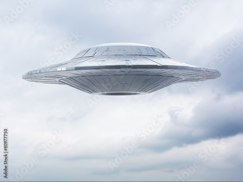 Plakat UFO na tle nieba