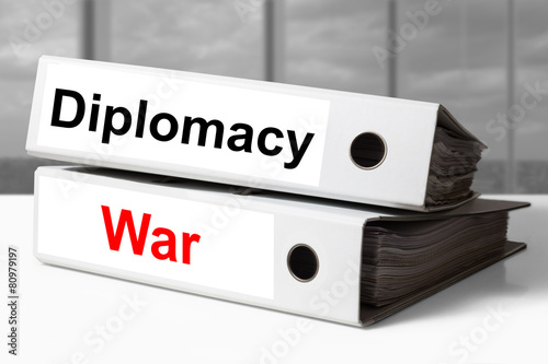 Fotografía stack of office binders diplomacy war