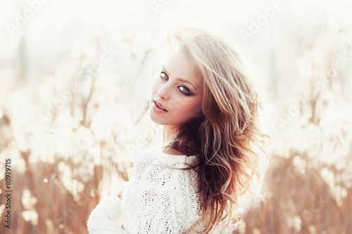 Fotografie, Tablou Sunny portrait of a beautiful young blonde girl
