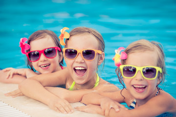 happy children in the swimming pool