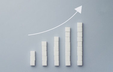 Positive graph chart made of sugar cubes