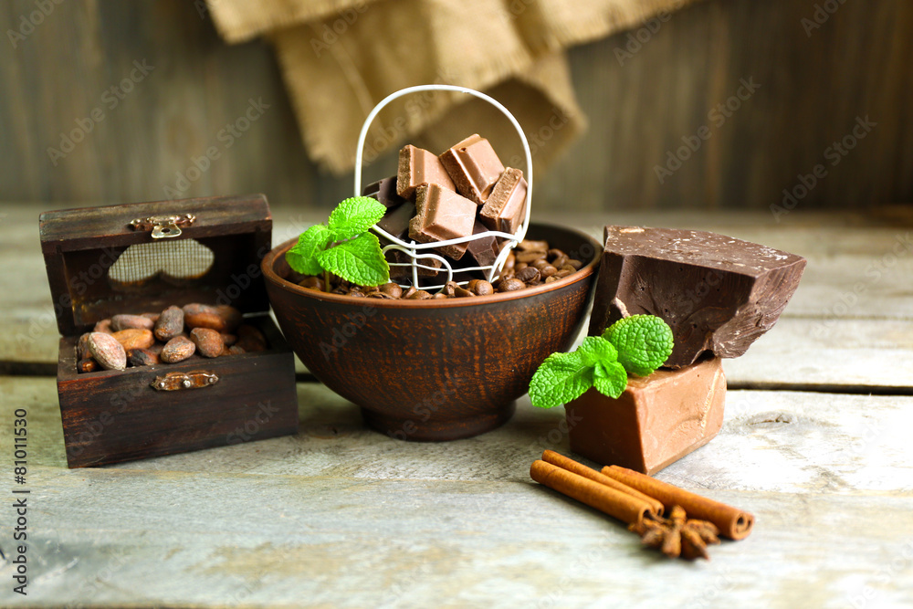 Still life with set of chocolate on wooden background