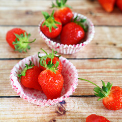 Sweet strawberries in the cake pans