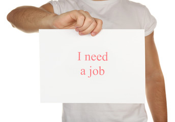 Wall Mural - Sheet of paper with inscription I need a job in male hand isolated on white